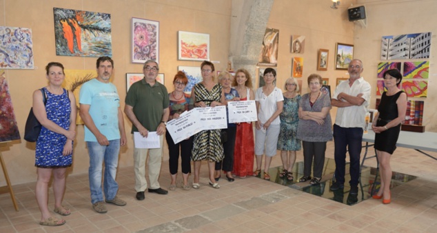 Les lauréats 2015 entourés des élus des deux communes et des membres du jury. Les lauréats 2015 entourés des élus des deux communes et des membres du jury.